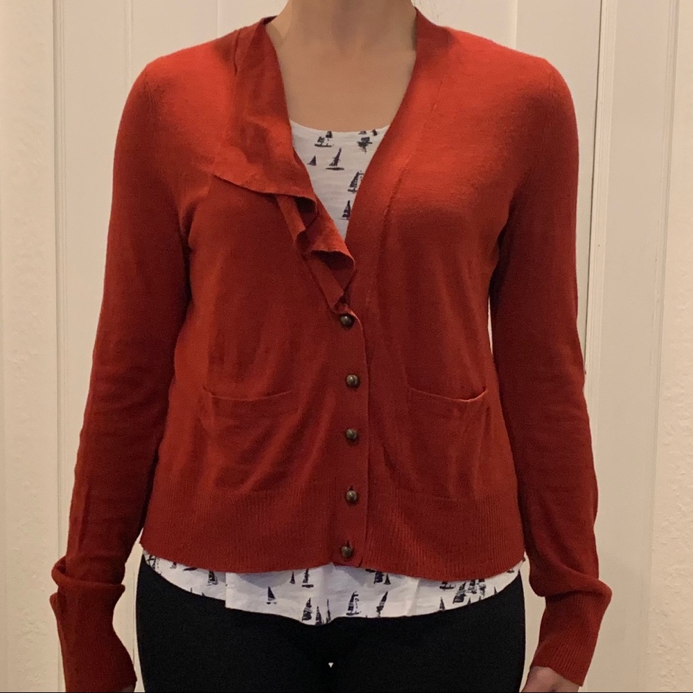 Cute ruffly rust colored cardigan